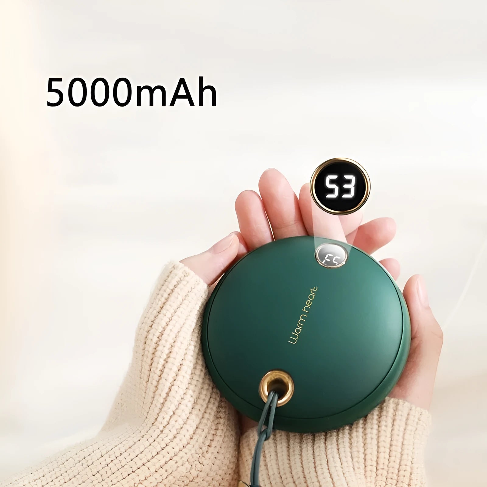 Green portable hand warmer power bank with digital display showing battery level, includes Type-C cable