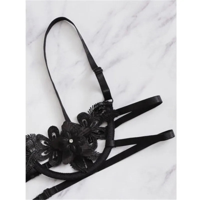 Women's black half cup unlined lingerie set with floral pattern and fitted straps
