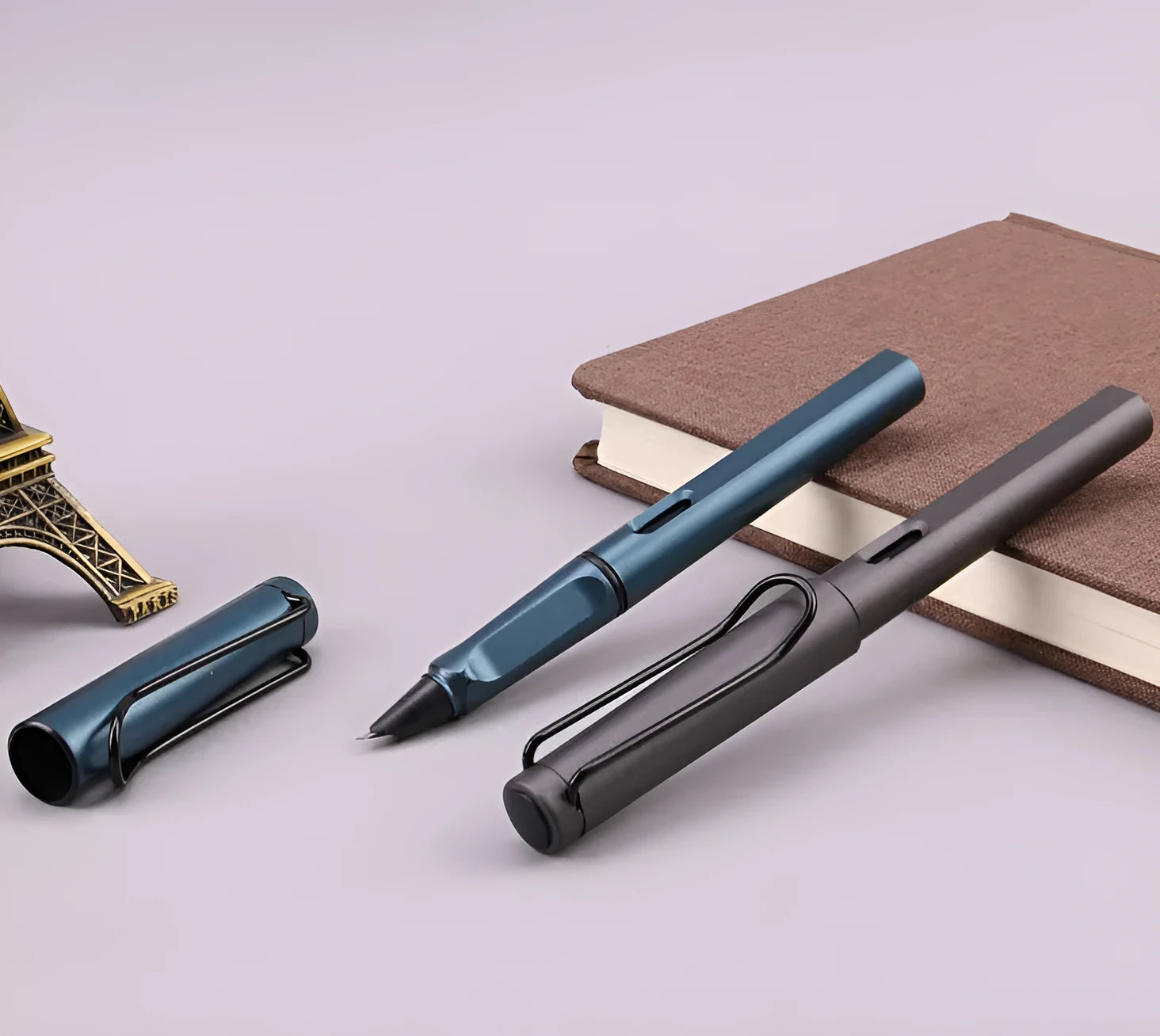 Black and blue frosted ink bag fountain pen showing 0.38mm and 0.5mm nib options.