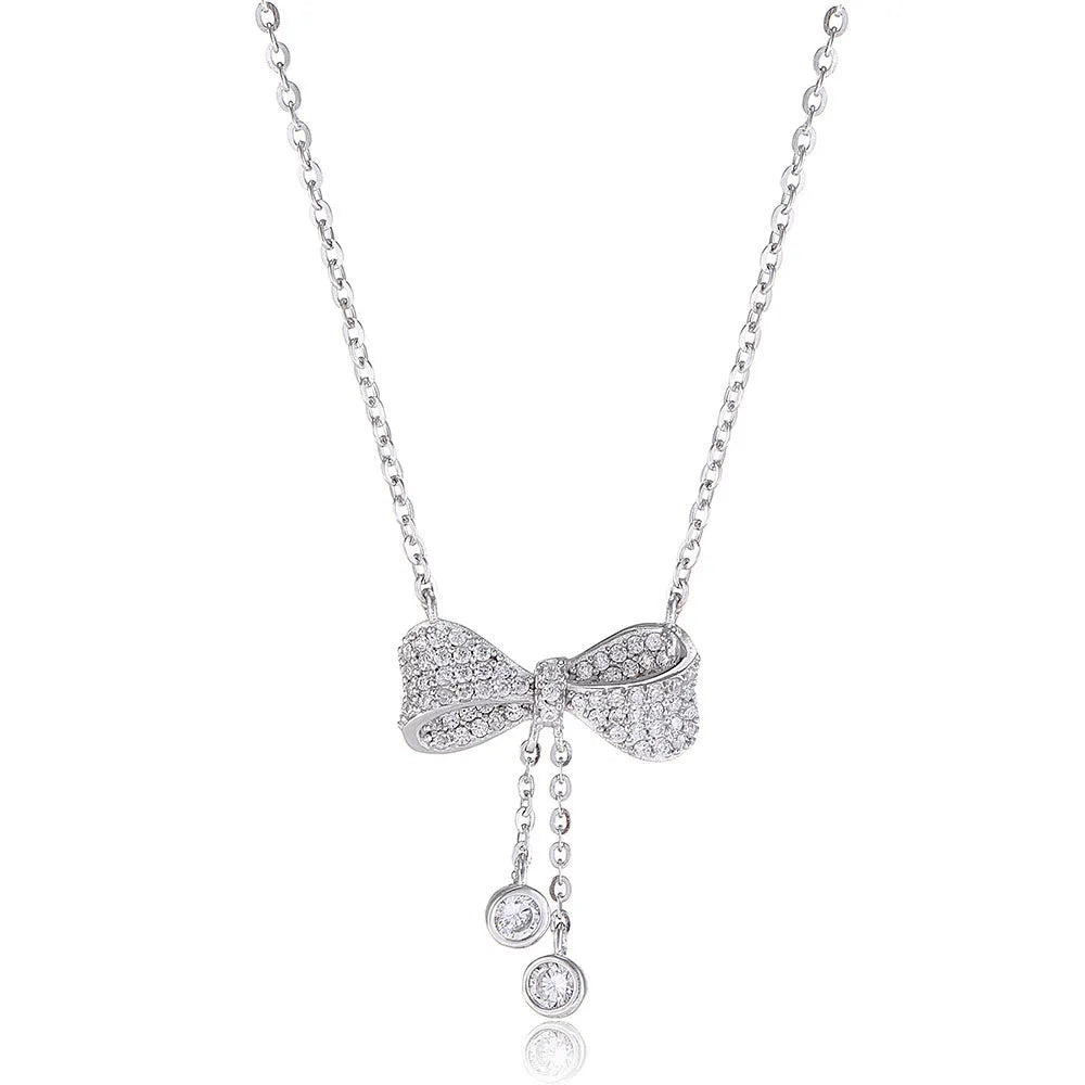 S925 sterling silver necklace with a bow pendant on an O-ring chain.