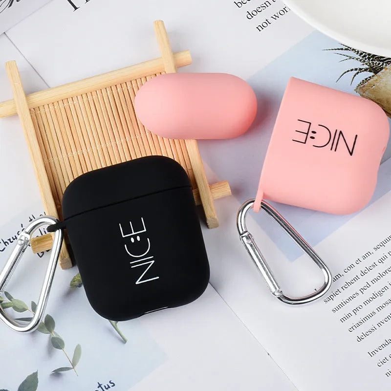 Black and Pink PC plastic protective case covers for AirPods with decorative Flower, Love, and Smiley face designs.