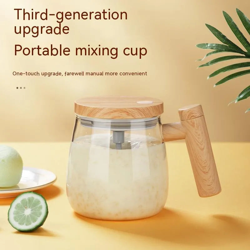 Clear borosilicate glass self-stirring coffee mug with electric base, 400ml capacity.