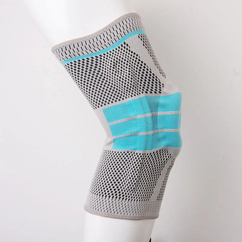 Sky blue elastic fibre knee pads with silicone grip for sports like basketball and running.