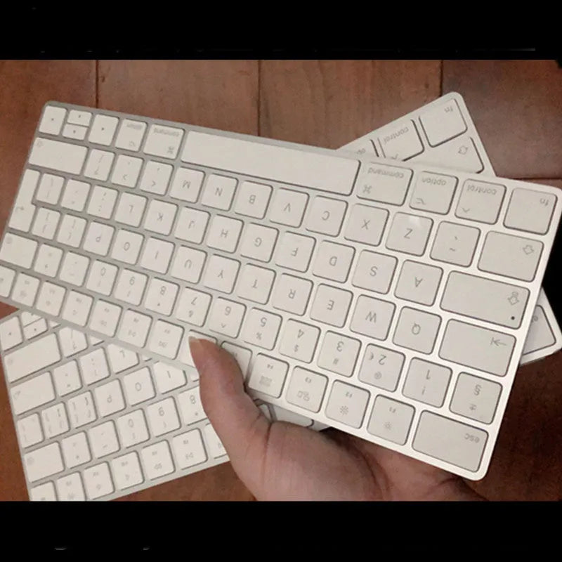White Apple G6 Bluetooth wireless keyboard with ultra-thin metal casing.