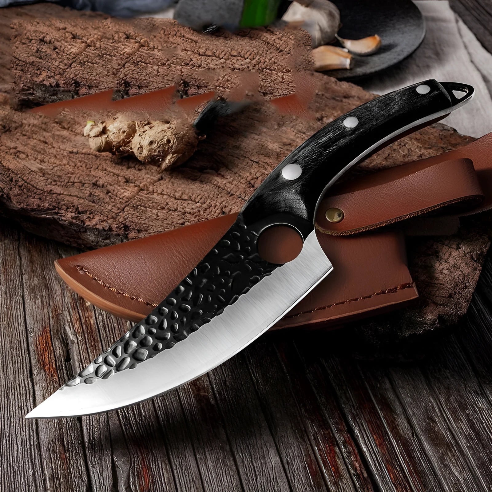 Butcher knife set with curved scimitar blade and straight boning knife in leather sheath