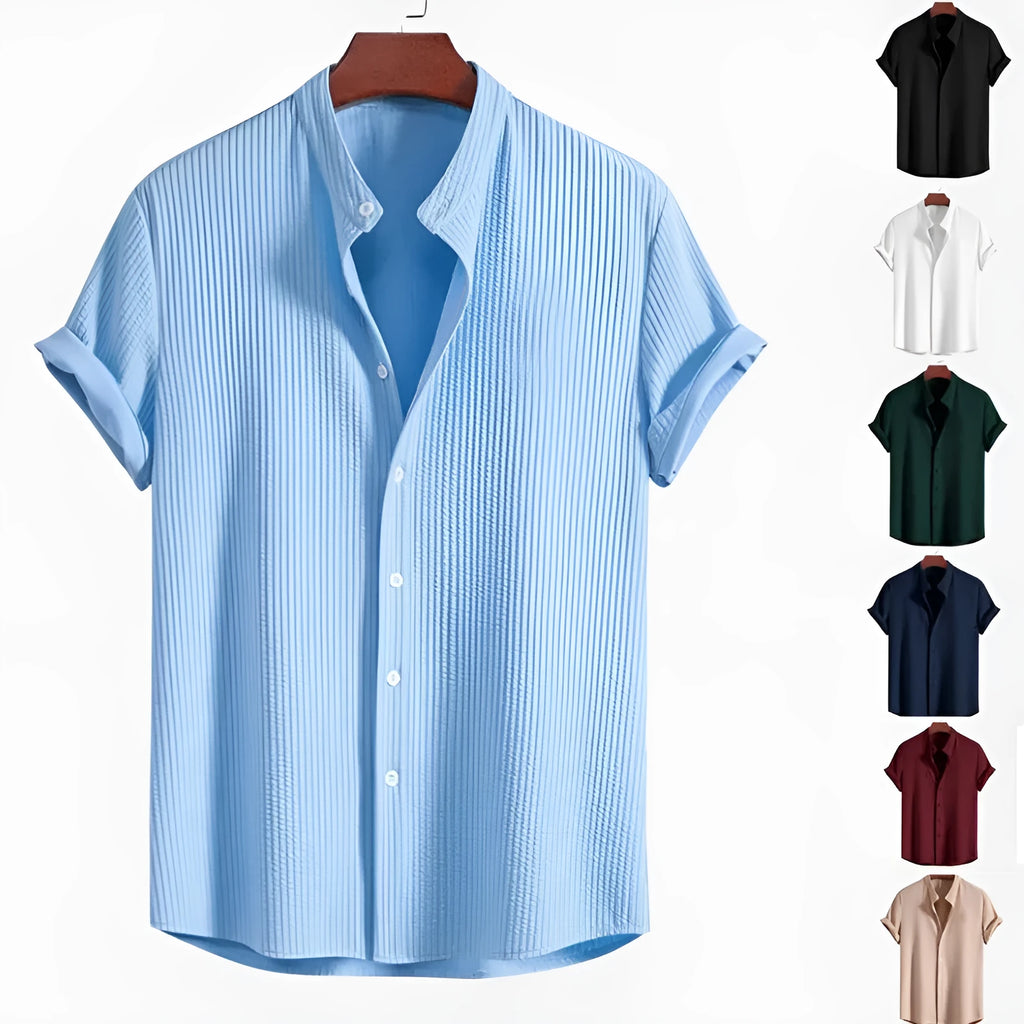 Men's loose fit short sleeve casual shirt in light blue, showing front view on a hanger.