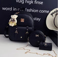 Three-piece PU leather backpack set for teenage girls in four colours with floral detailing