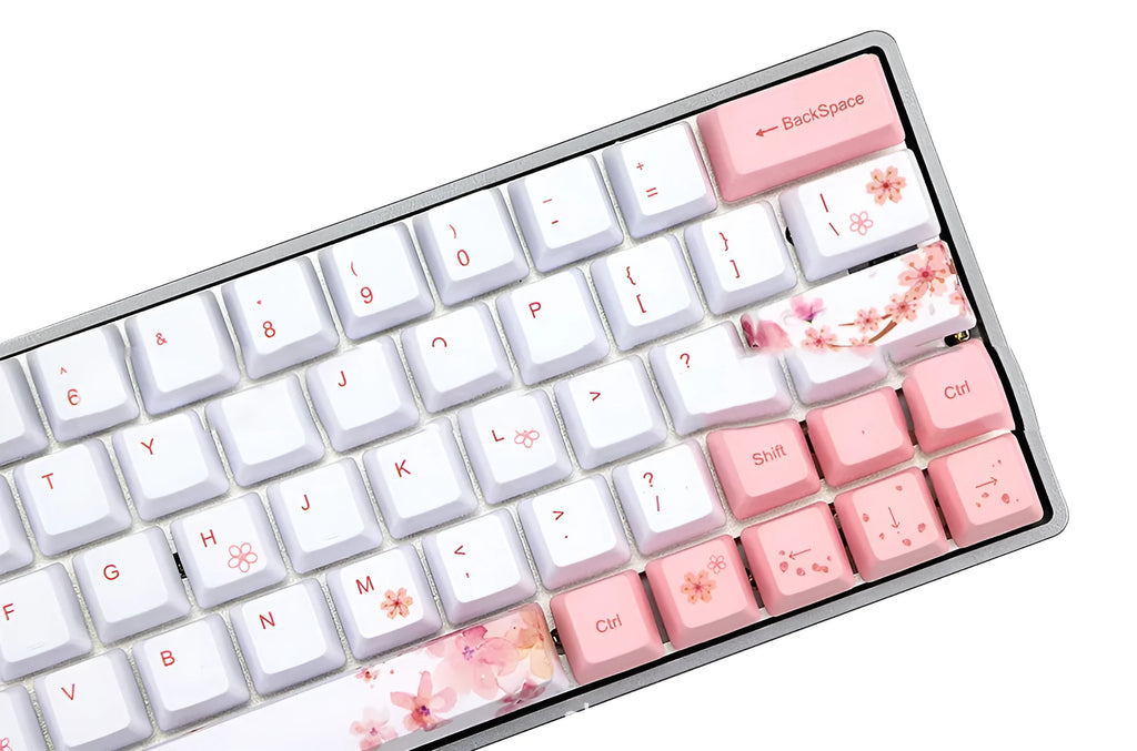 Pink PBT mechanical keyboard keycaps with white legends on top and sides, shown in an OEM profile.