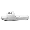 Men's large size open-toe slippers with a rubber sole, shown in black and white colour options.