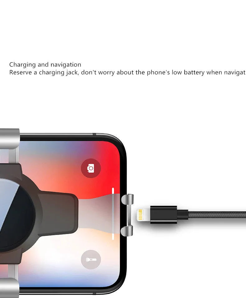 Black S4 gravity mirror car phone bracket mounted on air conditioning vent holding smartphone