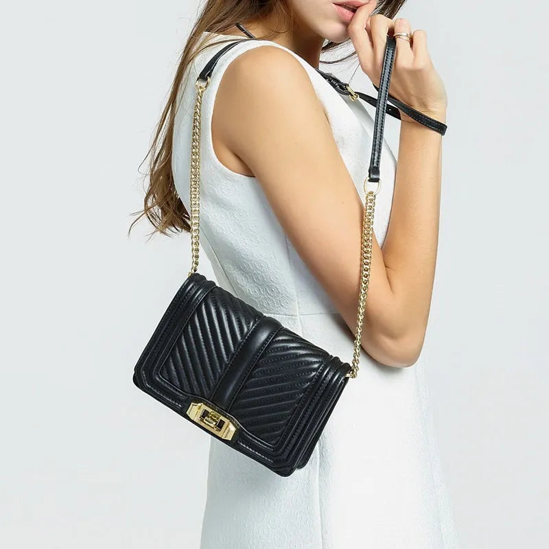 Women's shoulder chain bag in first layer cowhide with plaid pattern and chain strap, square shape