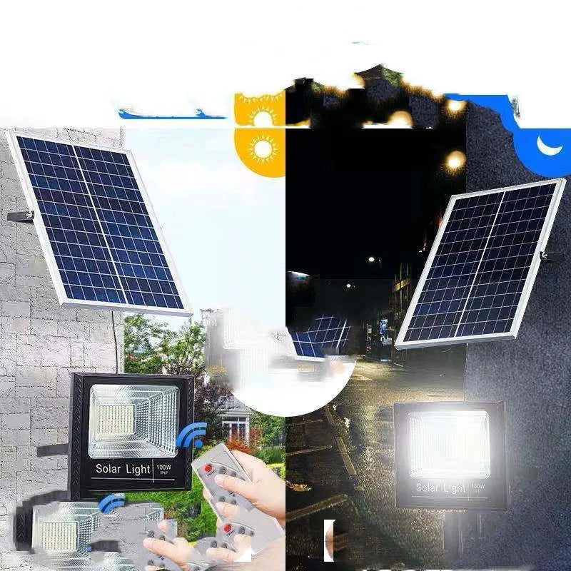 Black solar powered outdoor flood light with LED panels and remote control on a garden wall.