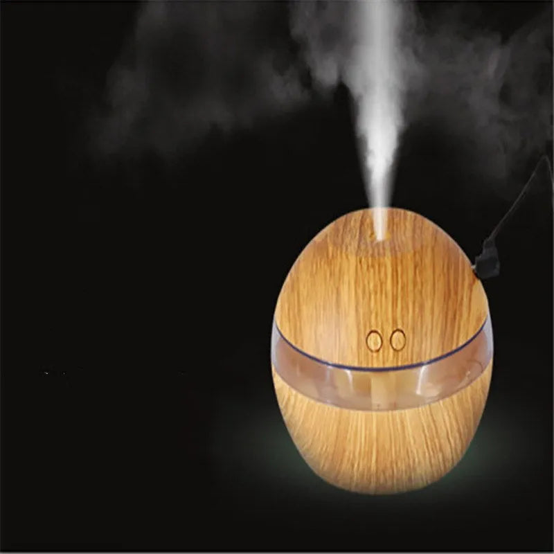 Brown wood grain USB humidifier with 200ml water tank showing adjustable mist control