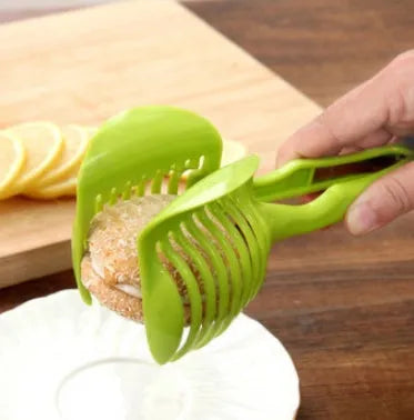 Plastic tomato cutting holder with slicing gaps on 18.5x8 cm board