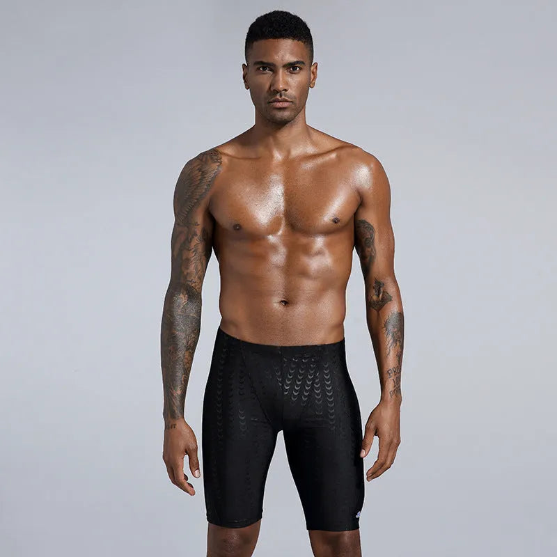 Men's solid colour waterproof polyester swimming trunks for beach and surf, shown in larger sizes.