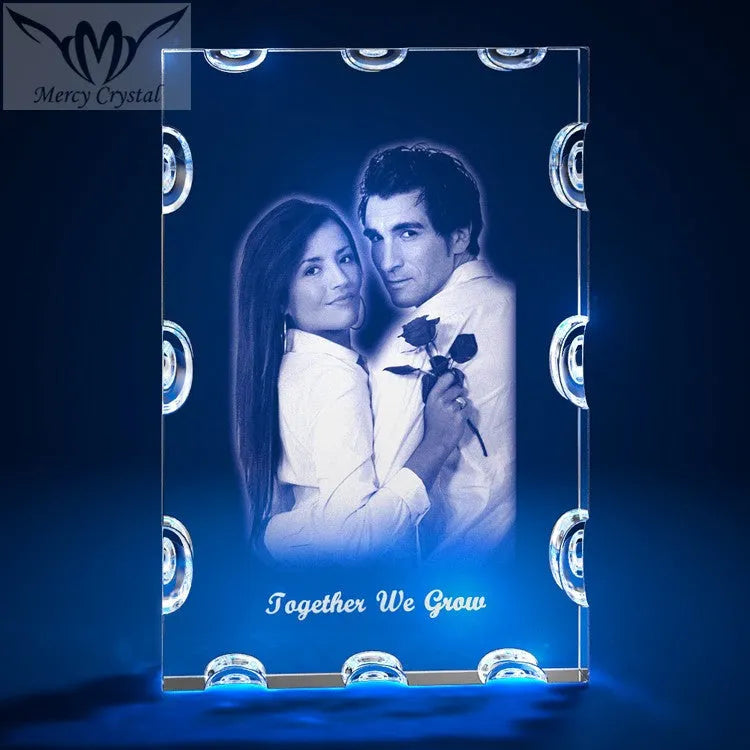 Custom laser engraved crystal sphere with personalised photo inside, available in multiple sizes and styles