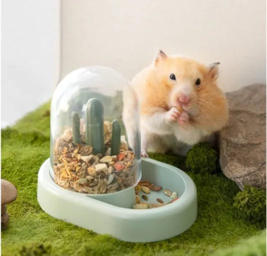 Transparent automatic hamster feeder with 190ml grain capacity in mint green colour