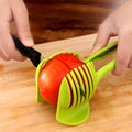 Plastic tomato cutting holder with slicing gaps on 18.5x8 cm board