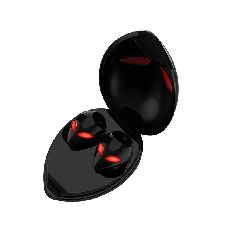 Creative Outer T8 Starman alien-design Bluetooth headset with red and blue lights in charging case.