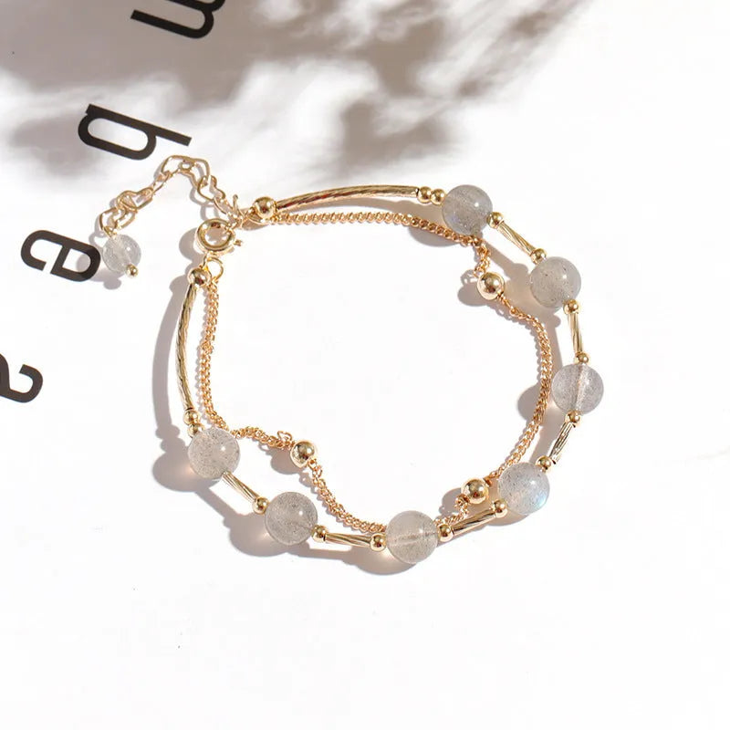 Double layer crystal bracelet with moonstone accents and electroplated copper finish in South Korean style