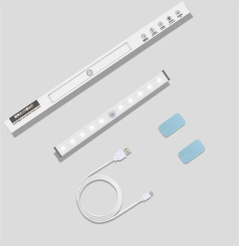 Silver aluminium LED closet light with motion sensor and magnetic back, shown illuminating a wardrobe.
