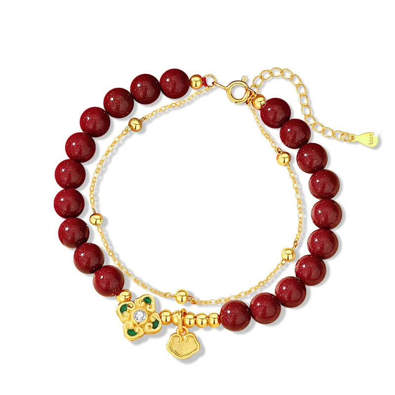 Sterling silver women's bracelet with geometric shape, Ruyi Xiangyun design, and cinnabar flower detail.
