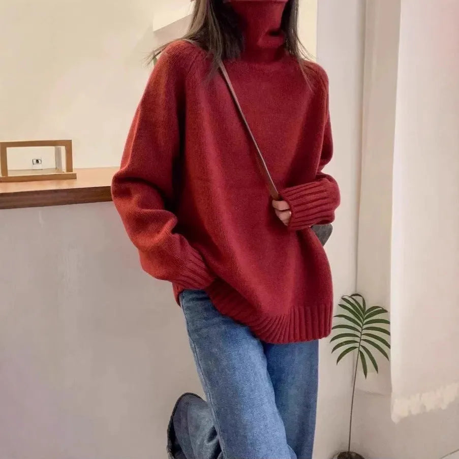 Women's loose-fit turtleneck sweater with curling pile collar in red solid colour