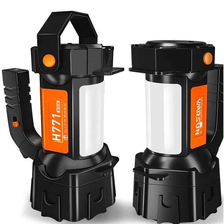 H771 portable handheld searchlight with shoulder strap, shown in an outdoor setting.