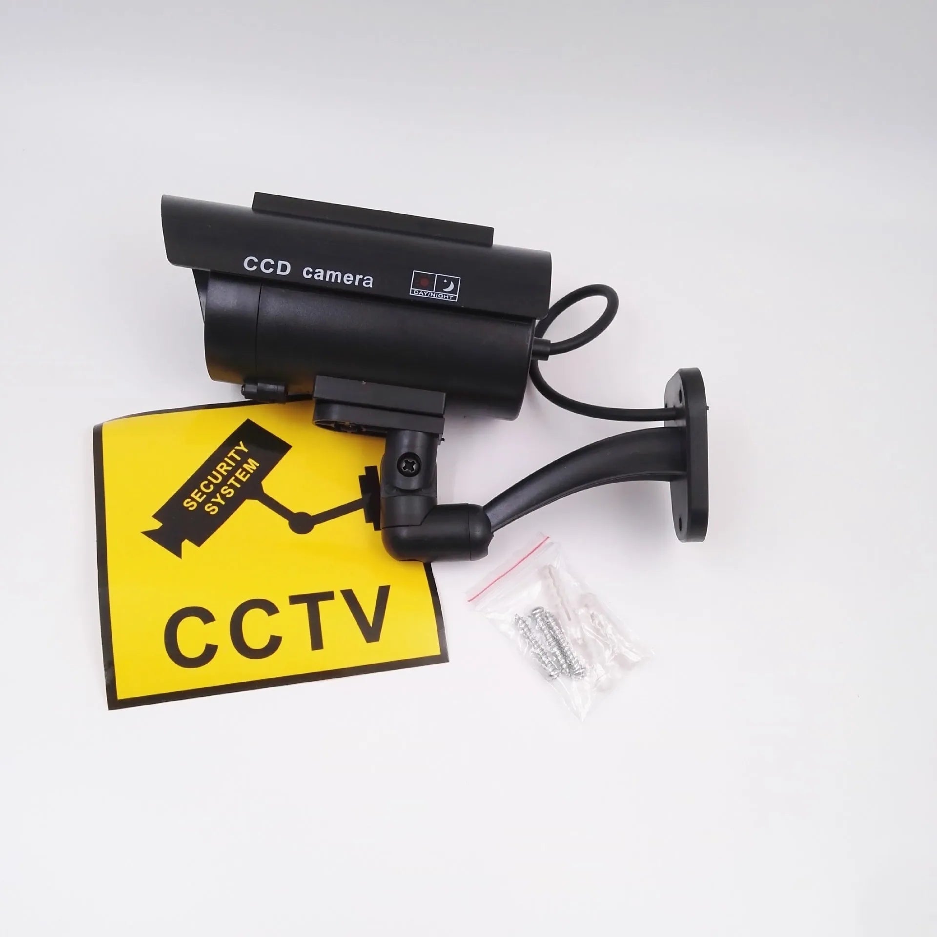 Black gun-style solar simulation security camera for indoor and outdoor deterrent use