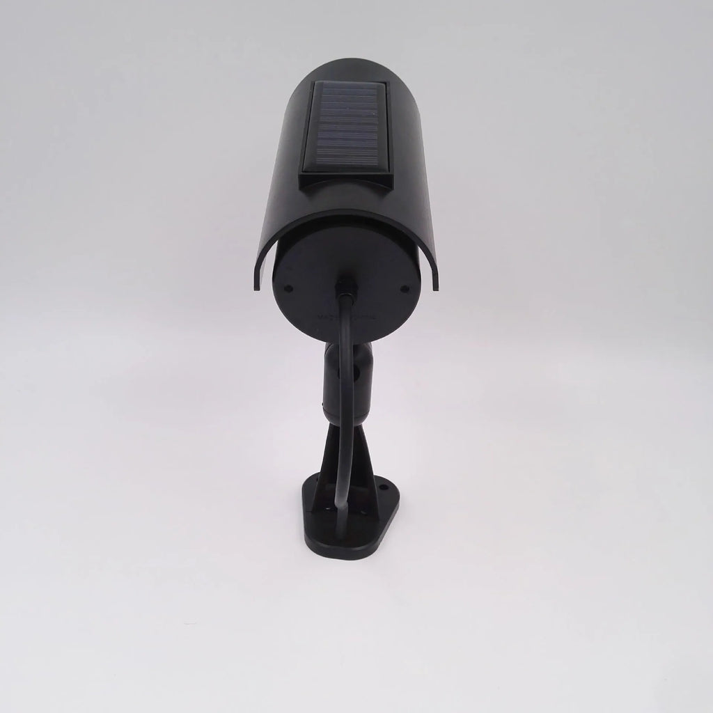 Black gun-style solar simulation security camera for indoor and outdoor deterrent use
