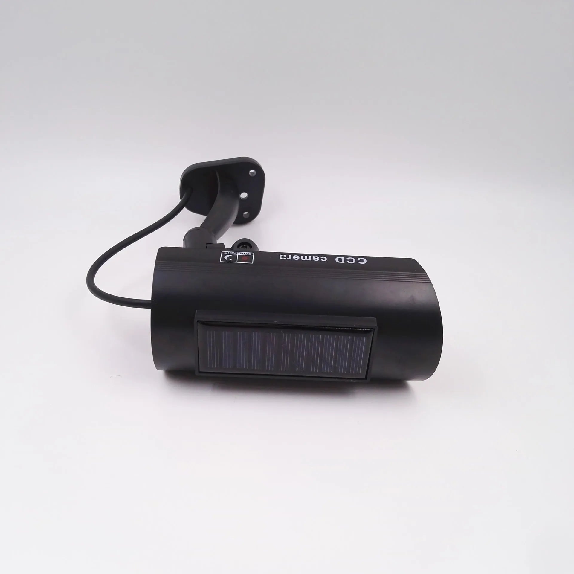 Black gun-style solar simulation security camera for indoor and outdoor deterrent use
