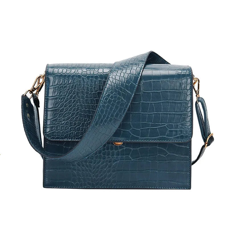 Stone pattern small square PU shoulder bag with flap closure and double straps, shown in blue, black, bronze, and yellow colour options