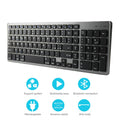 White ultra-thin rechargeable Bluetooth keyboard next to a tablet.