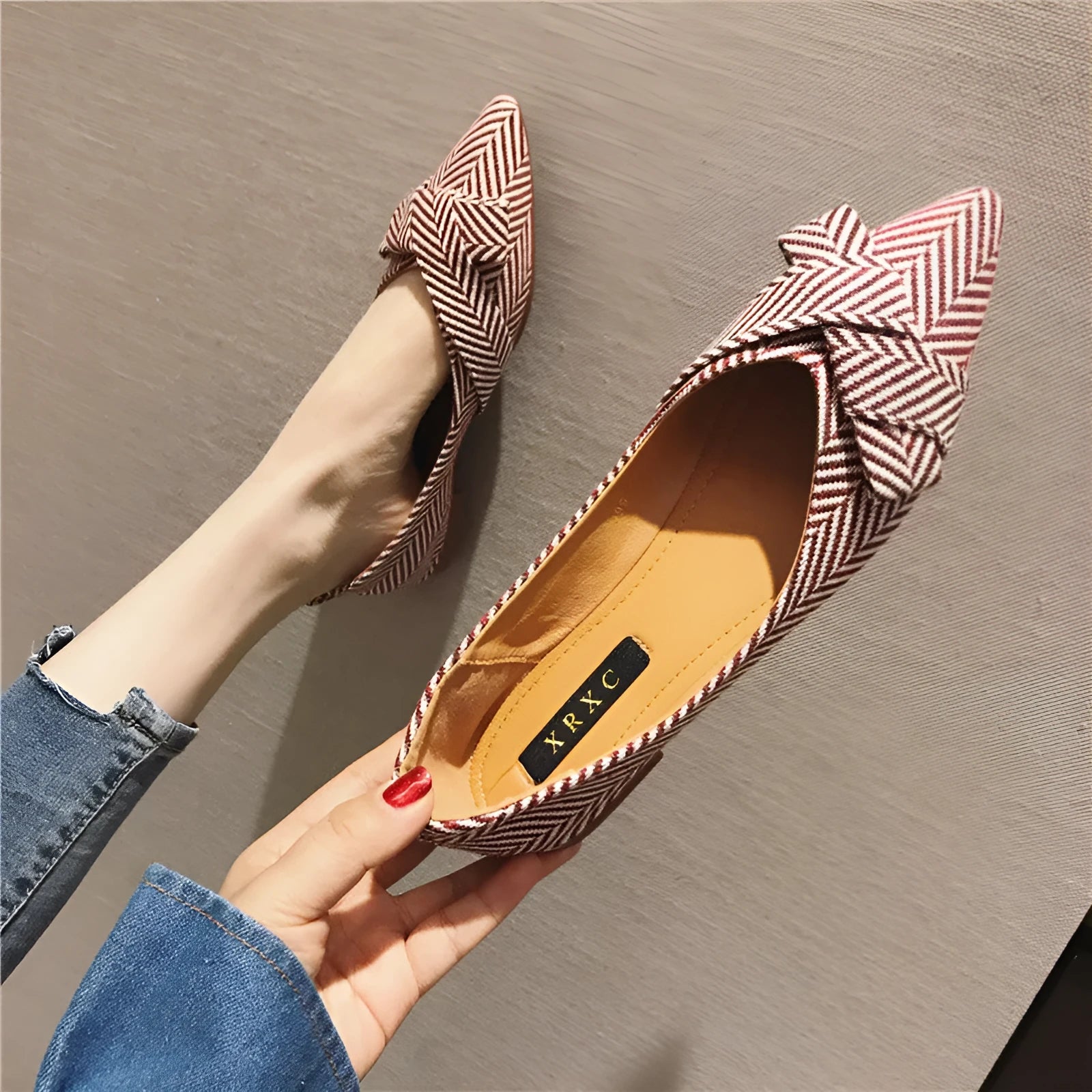 Women's pointed toe shallow mouth shoes in red and black with low flat heel