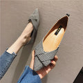 Women's pointed toe shallow mouth shoes in red and black with low flat heel