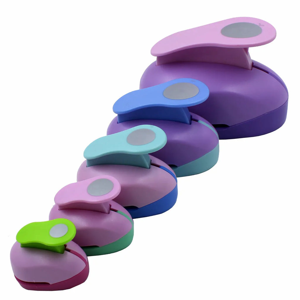 Colourful round children's puzzle embossing machine with six disc sizes on a card.