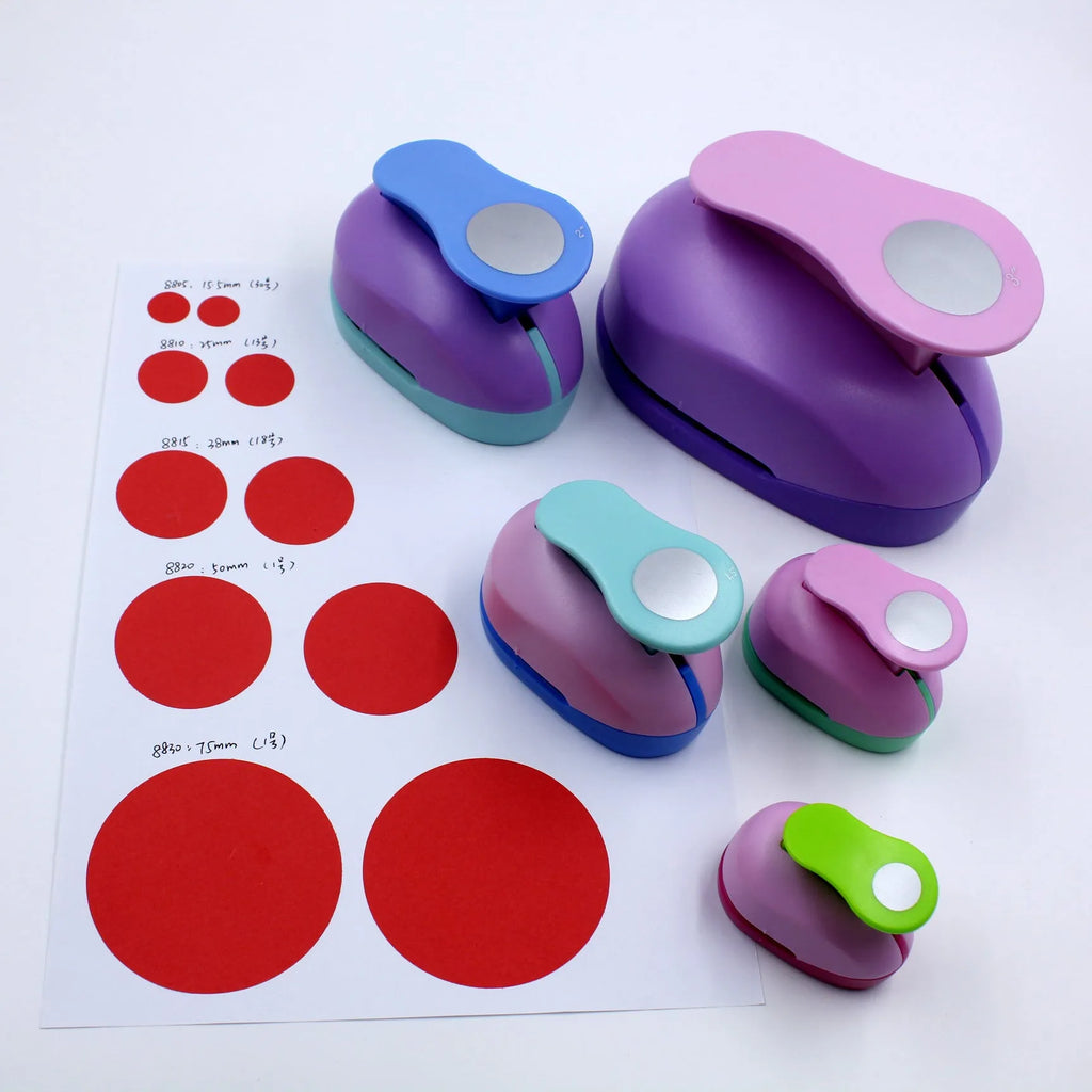 Colourful round children's puzzle embossing machine with six disc sizes on a card.