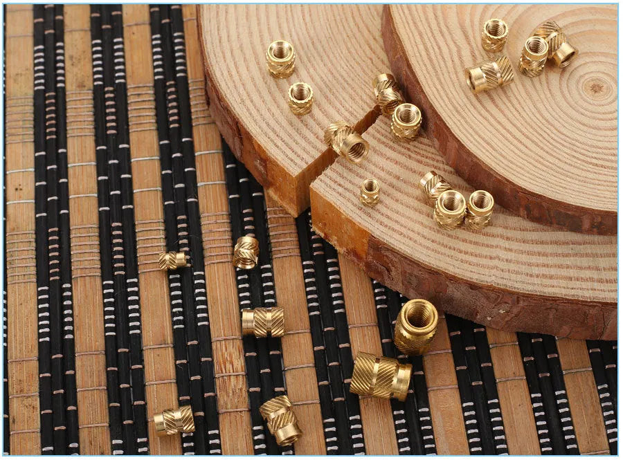 Brass hot melt copper nuts with M2 and M3 threads, showing outer diameters of 4.0mm and 4.2mm.