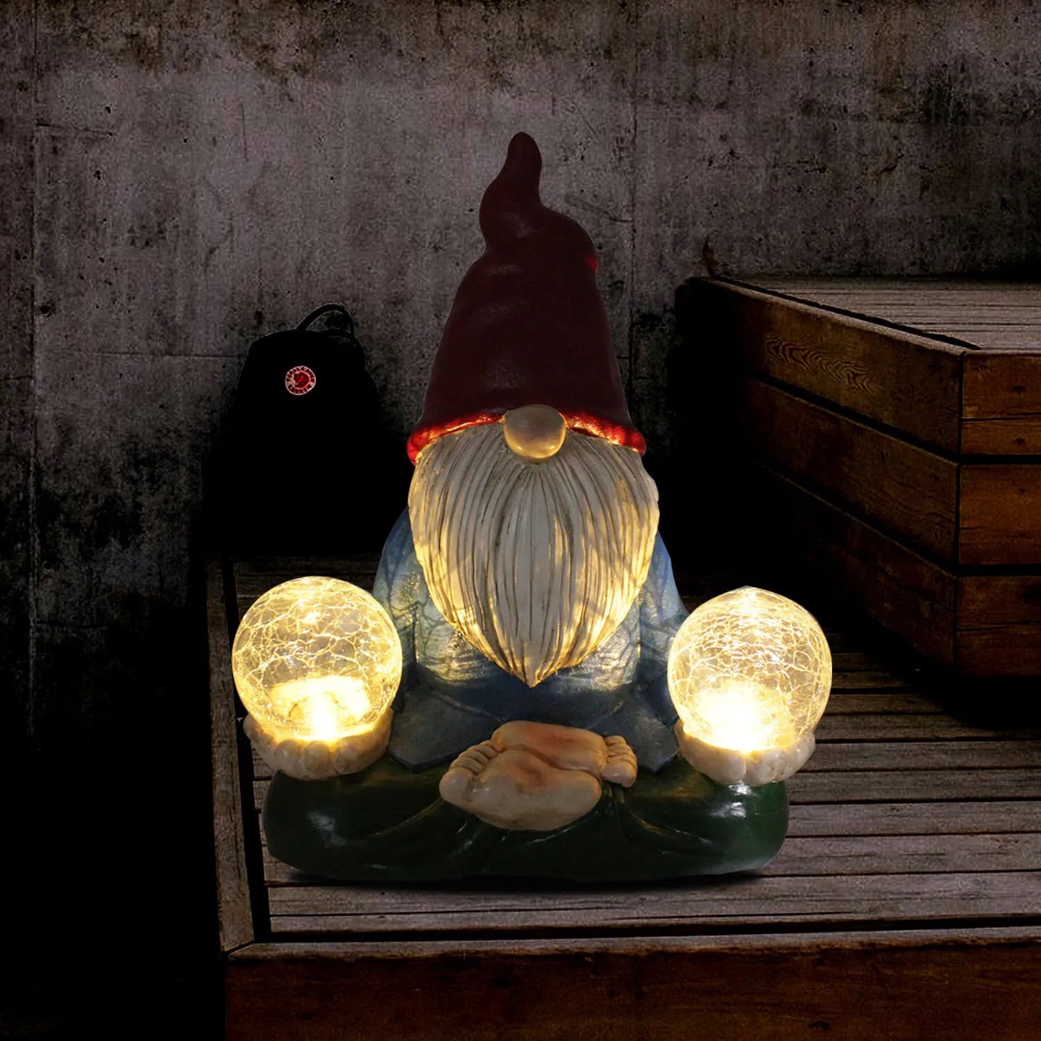 Solar LED resin dwarf doll garden ornament with faceless old man design measuring 27x20cm