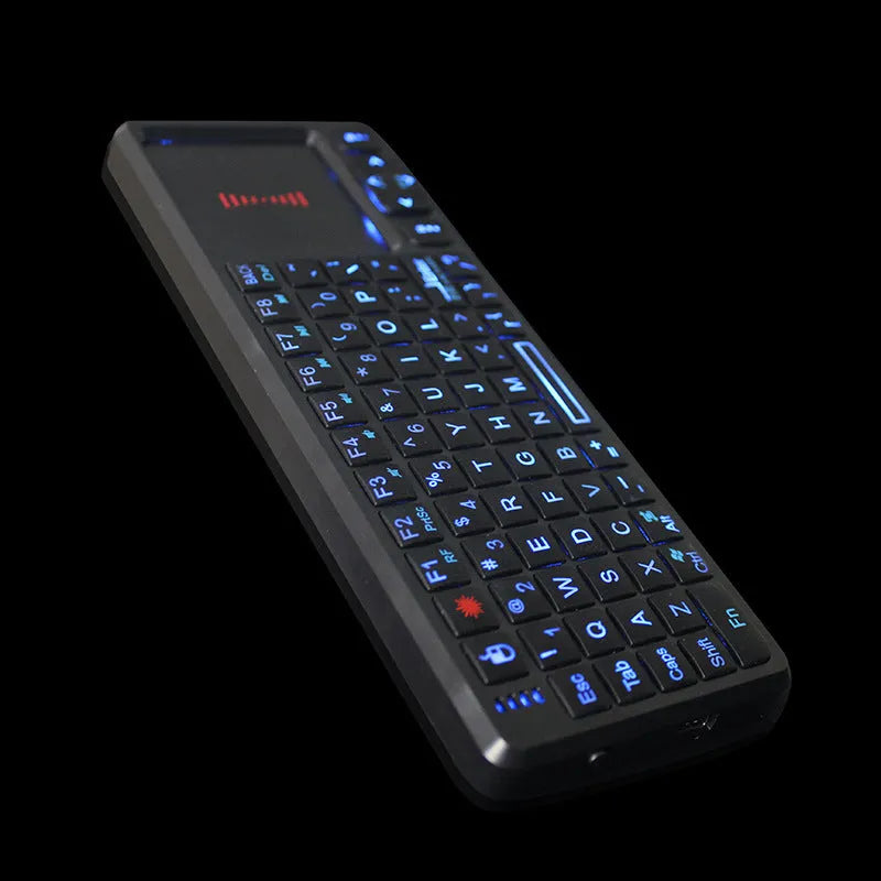 Black wireless mini keyboard with touch screen and matching laser mouse on a white background.