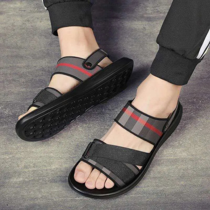 Youth leisure sports sandals with blue Lycra upper and grey polyurethane sole.