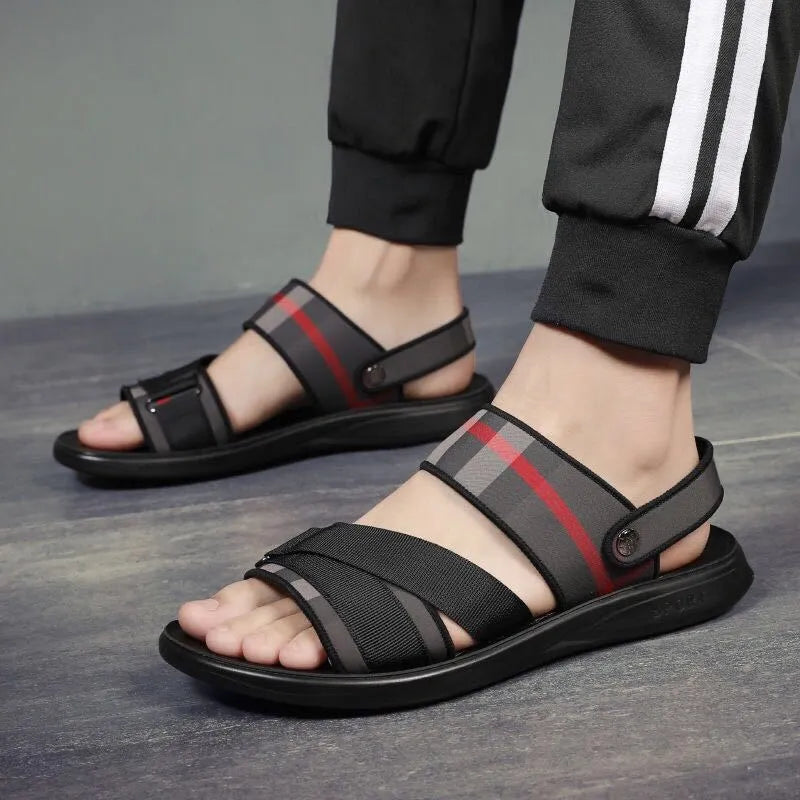 Youth leisure sports sandals with blue Lycra upper and grey polyurethane sole.