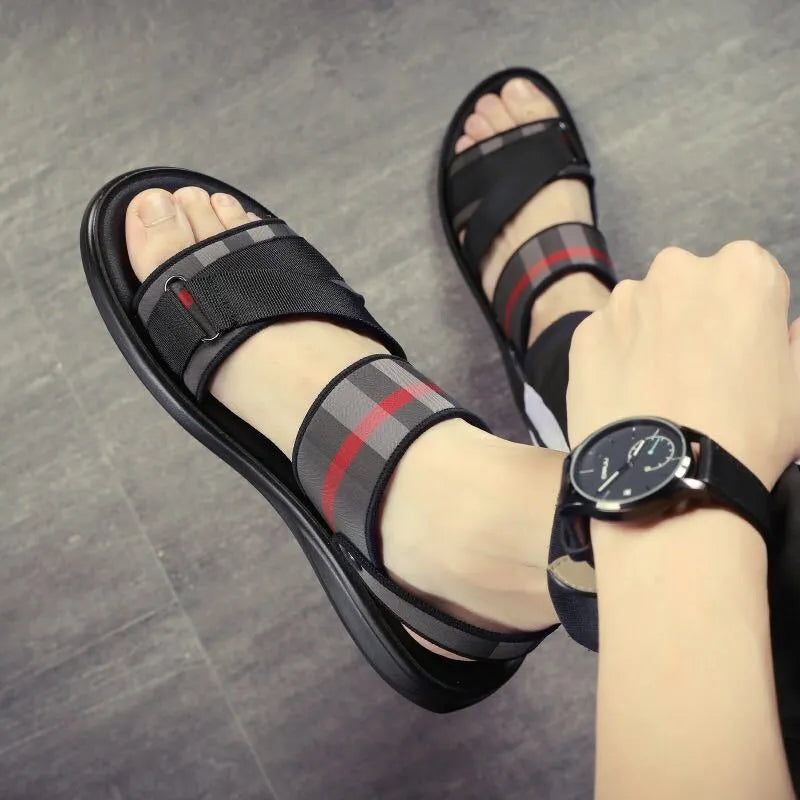 Youth leisure sports sandals with blue Lycra upper and grey polyurethane sole.