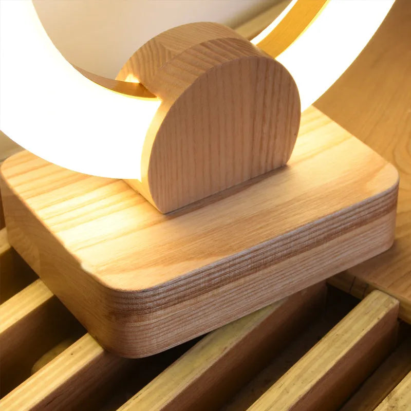 Nordic modern wooden art circular chandelier table lamp with a round acrylic shade, shown in 20cm and 30cm diameter options.