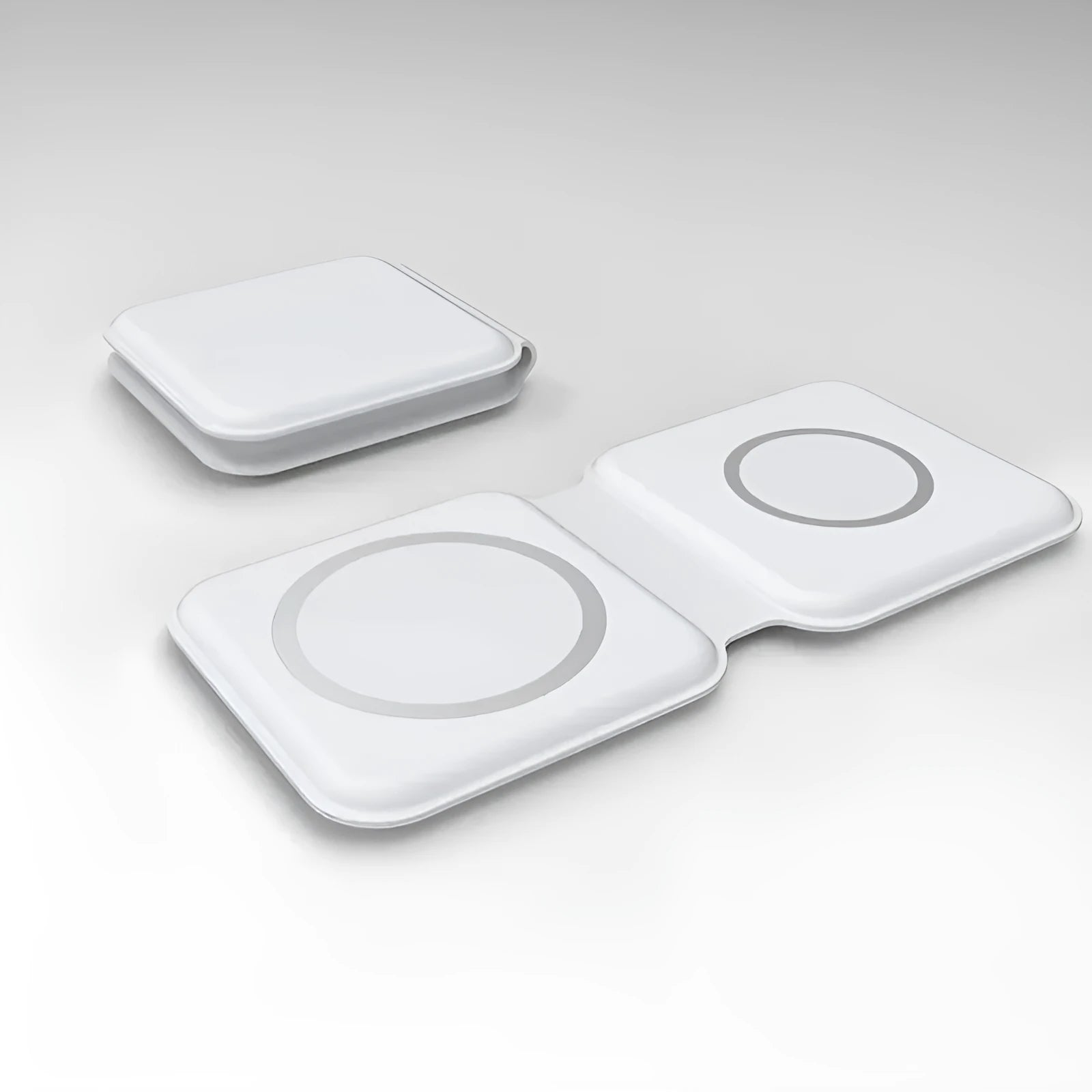 White folding dual magnetic wireless charging dock shown in stand mode with a phone attached.