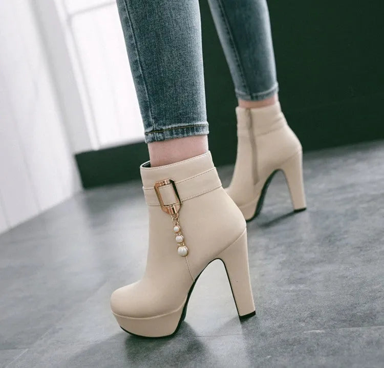 Waterproof platform thick heel women's Martin boots in black with side zipper and tassel detail