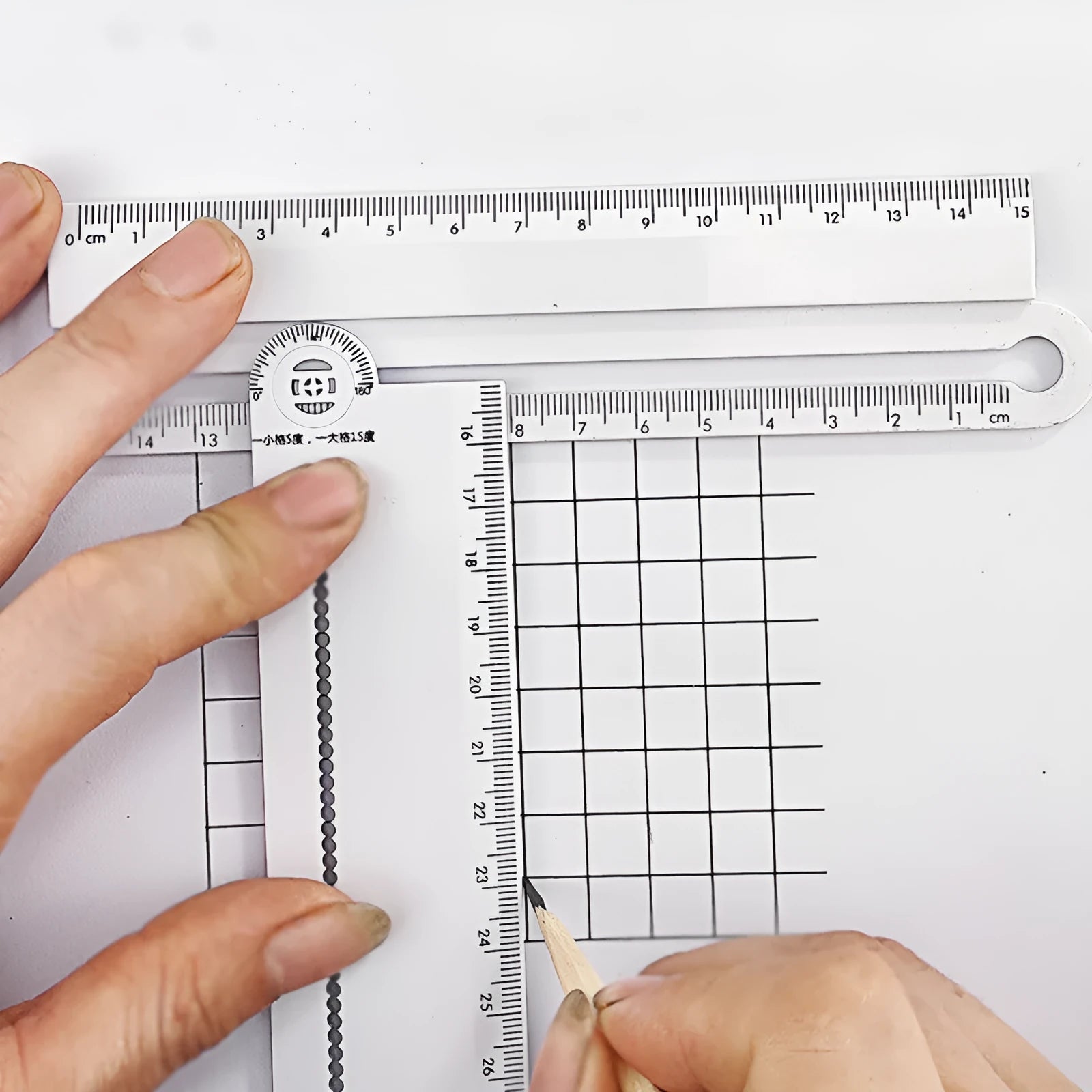 30cm white plastic multi-function set ruler showing straight edge and angle measurement markings
