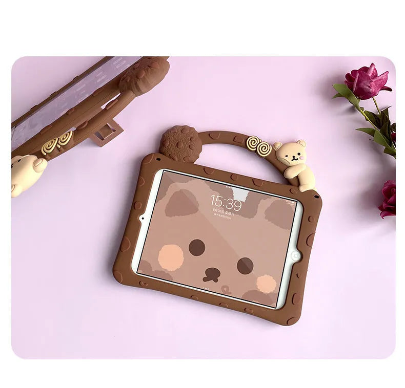 Brown cartoon-style silicone sleeve for iPad with an integrated flip-out bracket stand.