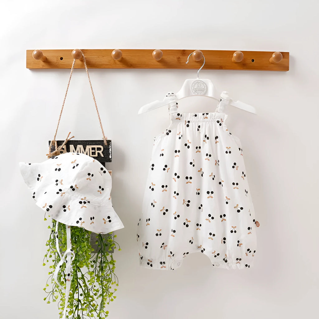 Baby girl cotton romper in smiley sunflower print sleeveless with detachable hood