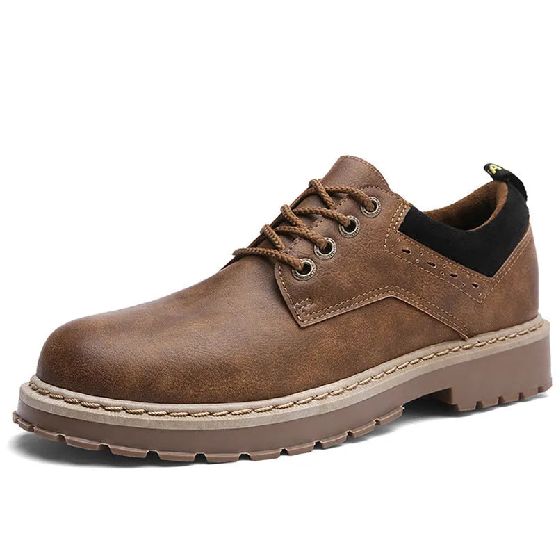 Men's black casual tooling shoes with round toe and rubber sole on a white background.